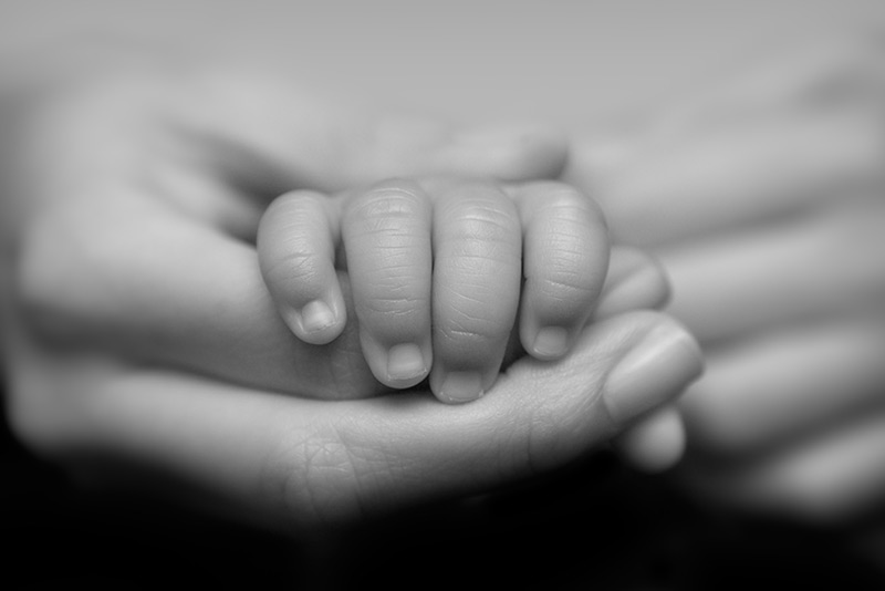 baby hands adopt baby foster infertility